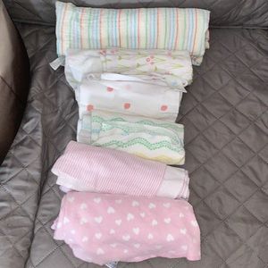 Girl receiving blankets 6 (1 muslin)